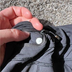 Black lululemon running leggings. Meant for running- mesh calves